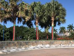 16 Trees and flowers welcome you to the main ceremonial entrance in Emancipation Park Kingston Jamaica